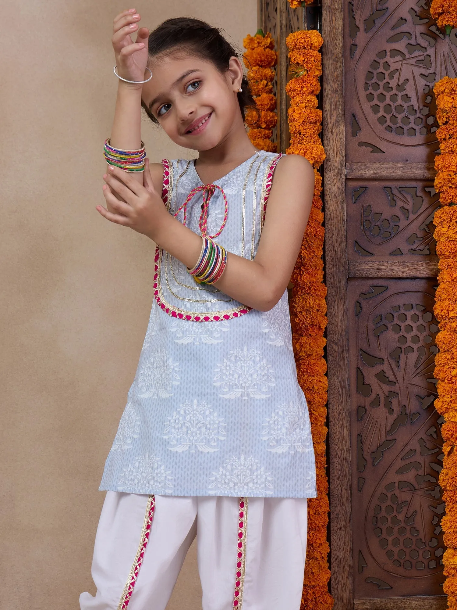 Girls Floral Printed Tie-Up Neck Straight Kurta With Dhoti Pants